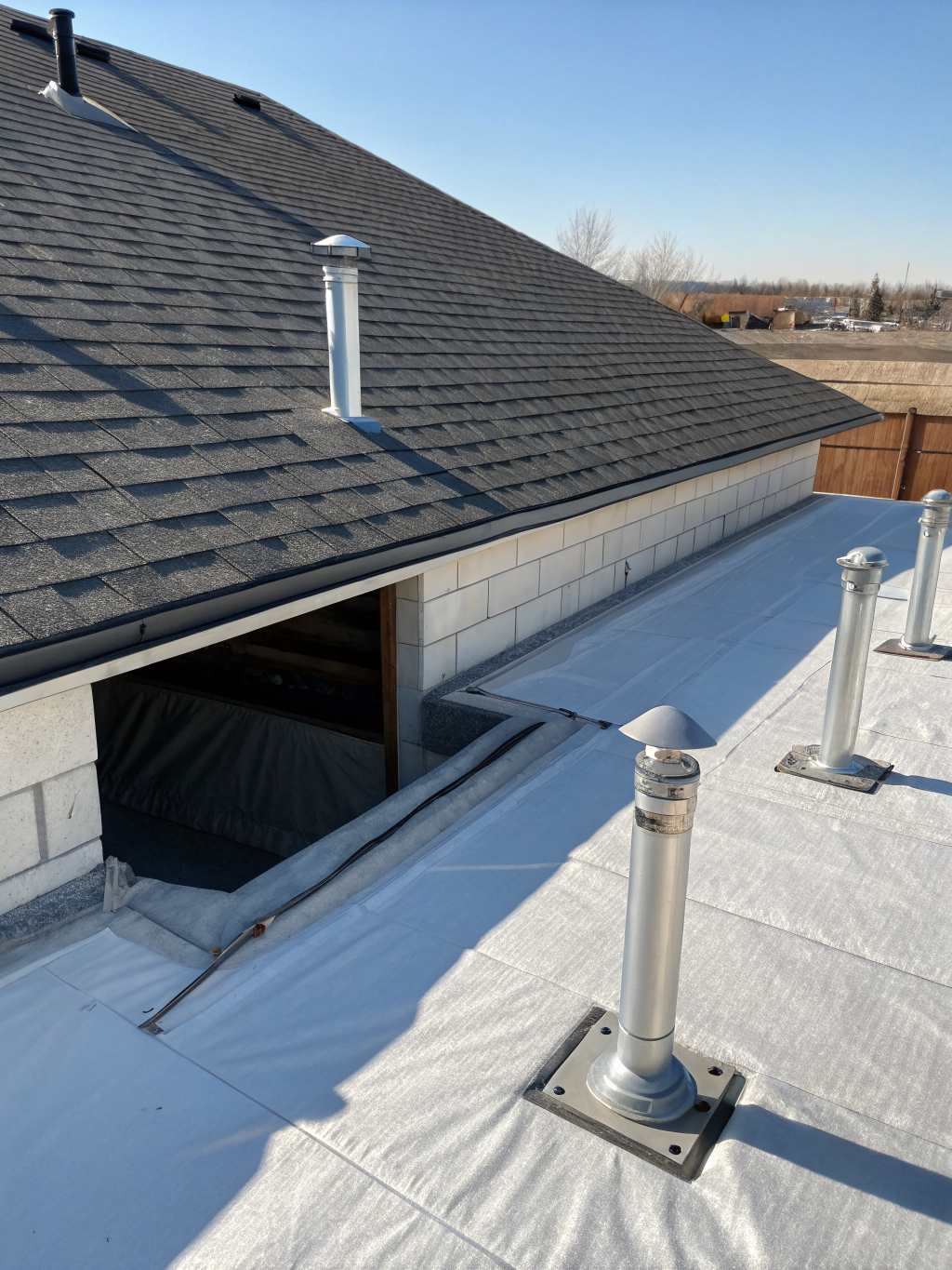 High-end encapsulated crawl space with white vapor barrier and structural piers